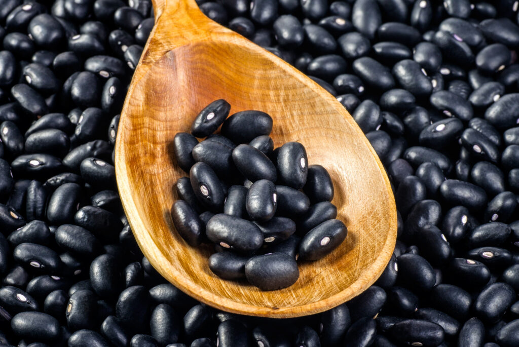 Black Beans In Wooden Spoon